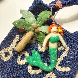 Nepalese handcrafted wool bag charm of mermaid and coconut tree